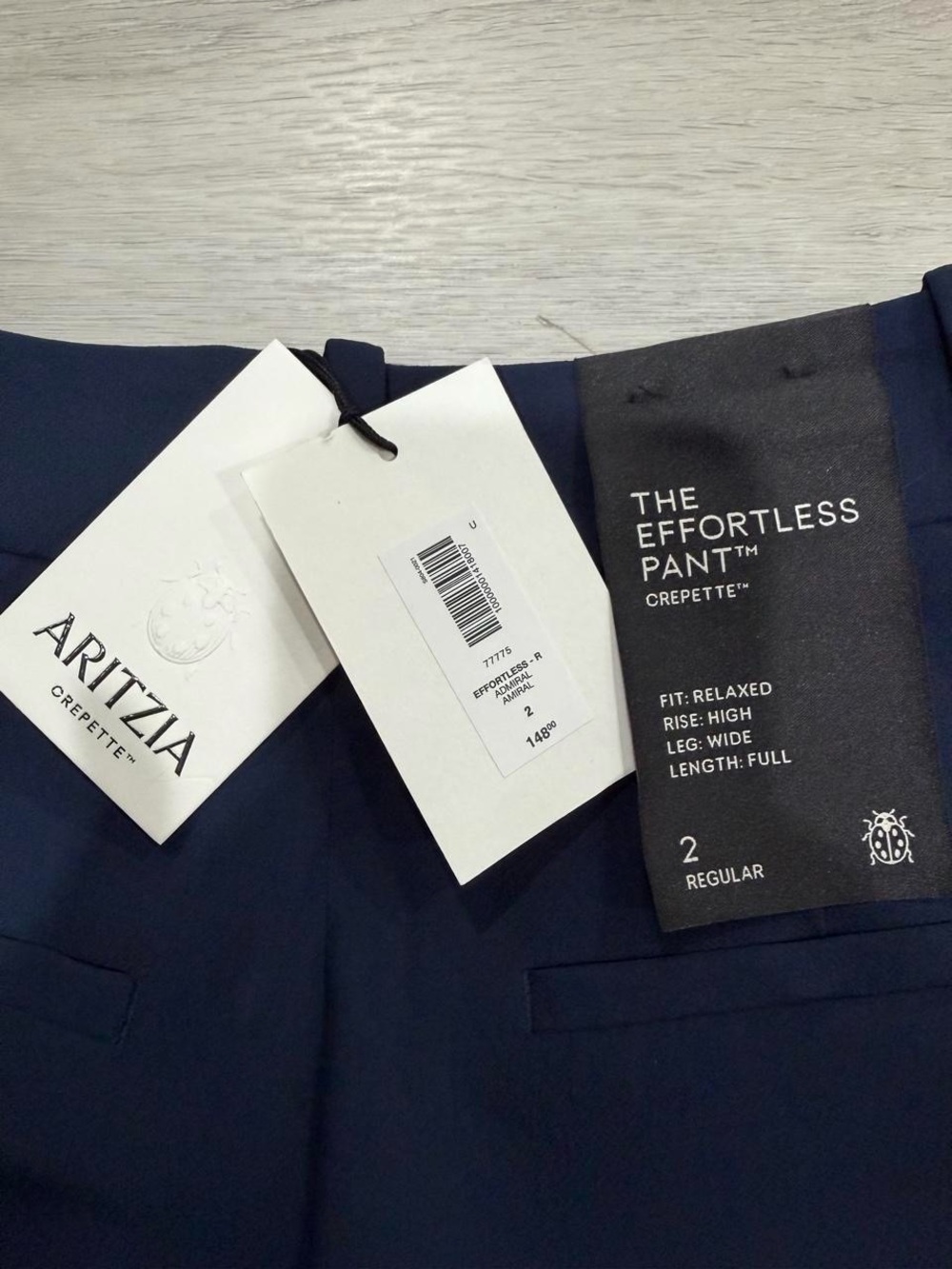 Aritzia The Effortless Pant™ - Crepette™ High-waisted, wide-leg trouser in navy. - Picture 8 of 8